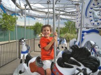 Five-year-old Alex can sing all the lyrics to "Take Me Out to the Ballgame," but it looks as if he liked the carousel best at Isotopes Park.